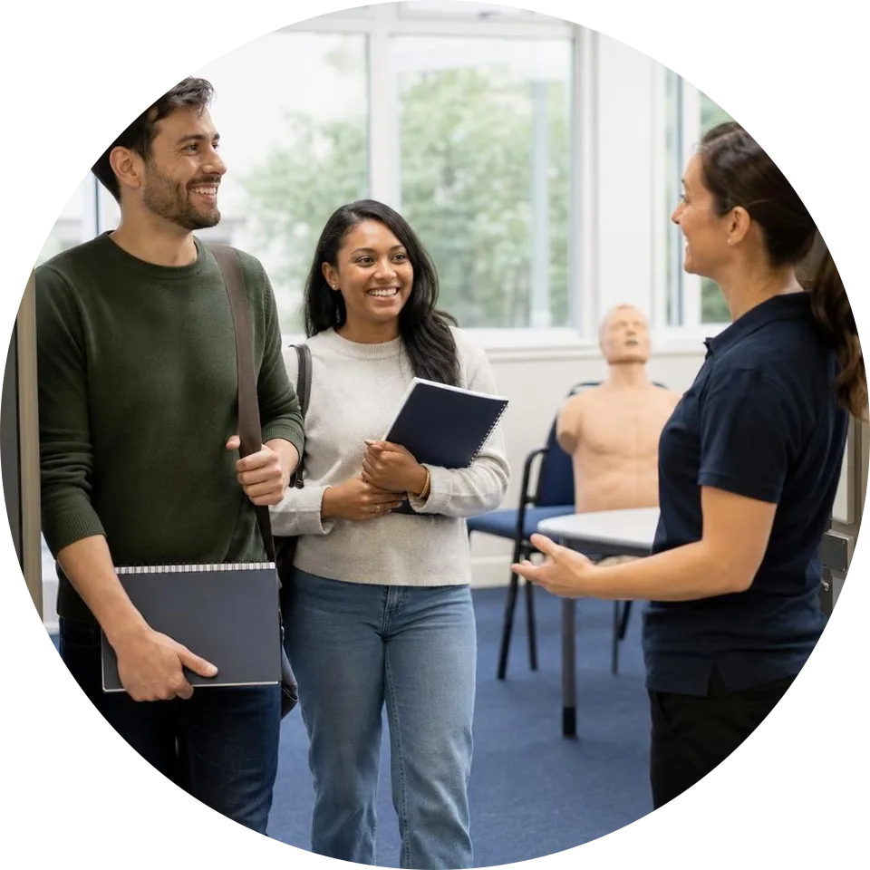 A welcoming training classroom with learners, a course bag and a notebook