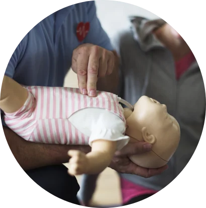 First aid practice on an infant training mannequin