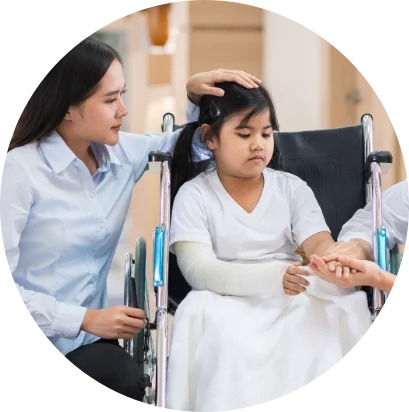 Caregiver supporting a child during first aid care